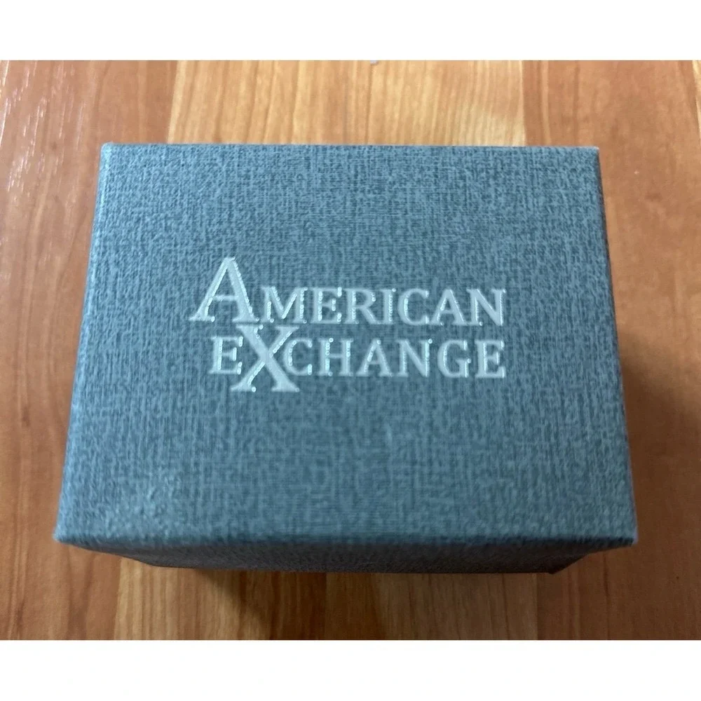 Set of two American Exchange watch straps, one light white and one‎ camou